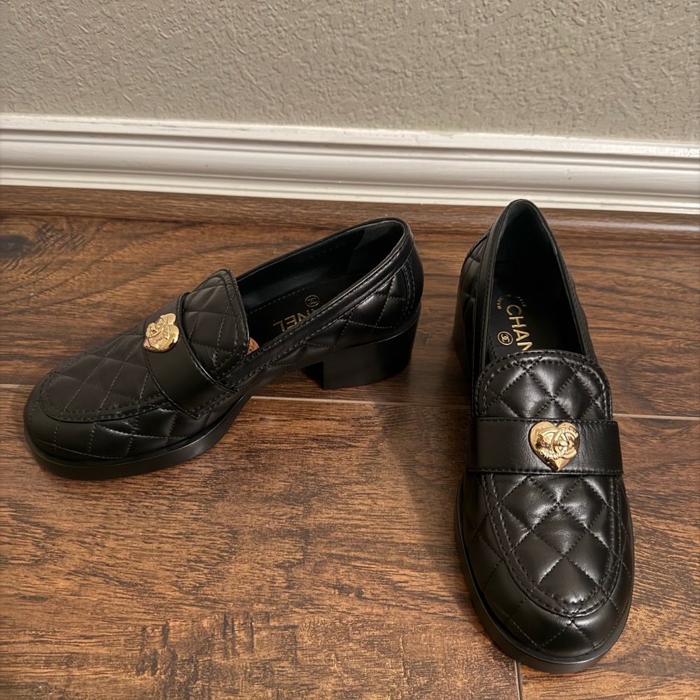 CHANEL Lambskin Black Quilted Loafers with Gold Accent